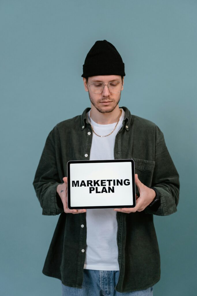 Man holding Marketing plan
